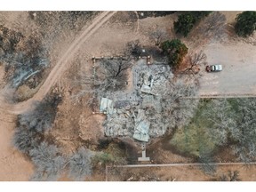 A destroyed ranch home following the Smokehouse Creek Fire in Miami, Texas, US, on Sunday, March 3, 2024. The Smokehouse Creek fire in Texas is the largest in the state's history and has consumed more than 1 million acres (405,000 hectares), according to Texas A&M Forest Service with dry gusts up to 50 miles per hour sweeping across Texas and the Plains through Sunday.