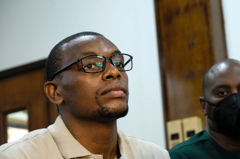 Kakwenza Rukirabashaija, who charges that he was tortured for weeks while in detention, appears before a court in a failed bid to have his passport returned so he could seek medical treatment abroad, at a court in Kampala, Uganda on Feb. 1, 2022. The prominent writer and government critic who accused Uganda's security forces of torture has gone into exile ahead of his looming criminal trial, his attorney said Wednesday, Feb. 9, 2022. (AP Photo/Hajarah Nalwadda, File)