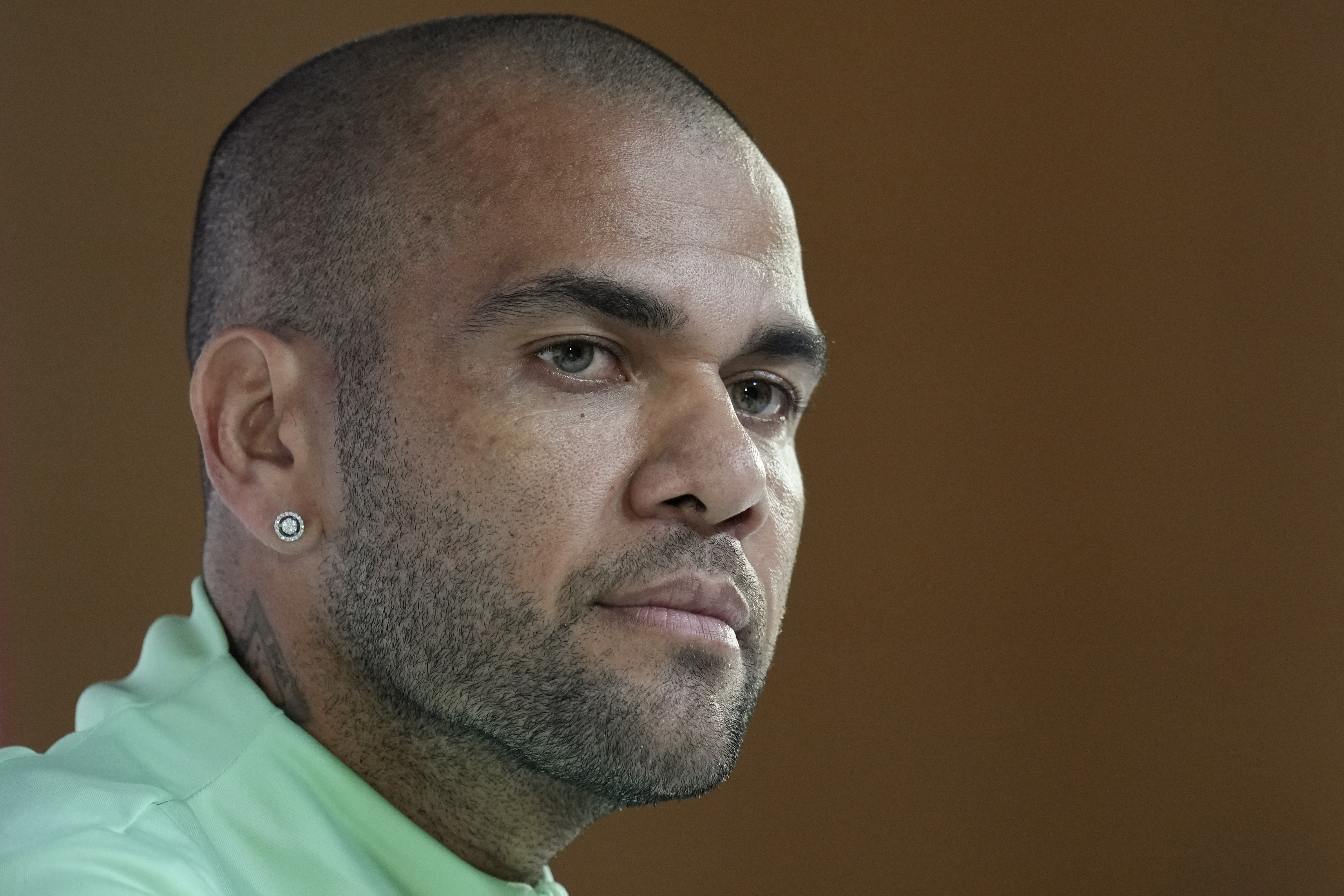 Brazilian defender Dani Alves has failed to make bail and will stay in prison for at least another night