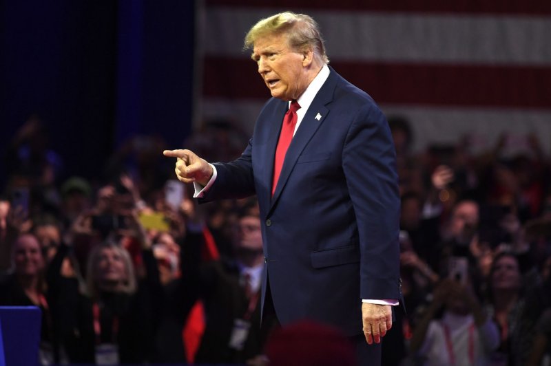 Former President Donald Trump arrives at CPAC on Saturday in National Harbor, Md. Trump is in the courtroom in Fort Pierce, Fla., Friday for a hearing in the classified documents case against him. Photo by Mike Theiler/UPI