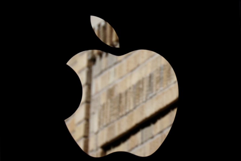 The Apple logo hangs outside of an Apple retail store in the SoHo Section of Manhattan in New York City on Thursday. The European Commission said it has opened an investigation into Apple, Meta and Alphabet on Monday. Photo by John Angelillo/UPI