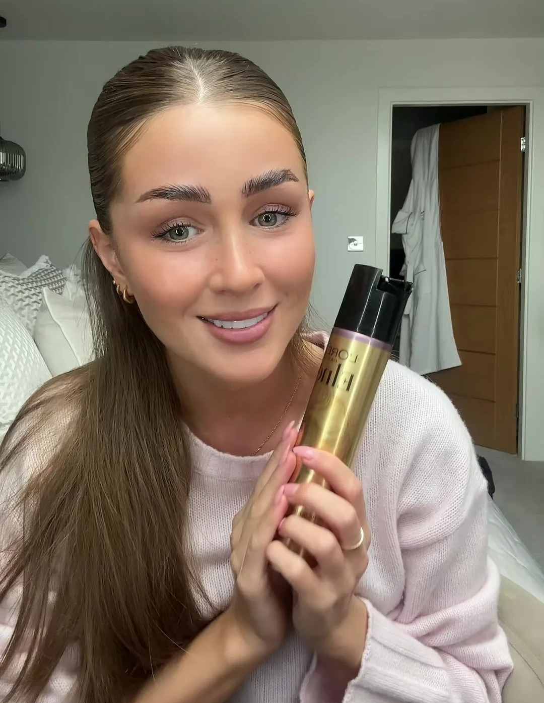 Georgia uses a £3 hairspray to secure her 'do in place