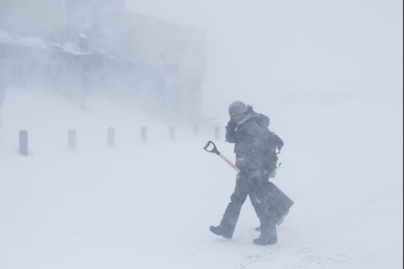 Blizzard conditions in the Sierra Nevada over the weekend left U.S. Interstates and commercial ski resorts closed and tens of thousands of people without power. Photo by Caroline Brehman/EPA