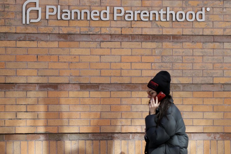 A pedestrian walks by a Planned Parenthood location in New York City in March 2017. On Monday, it was announced that the first-ever over-the-counter birth control contraceptive in the U.S. became available amid ongoing worries over reproductive rights in the United States. File Photo by John Angelillo/UPI