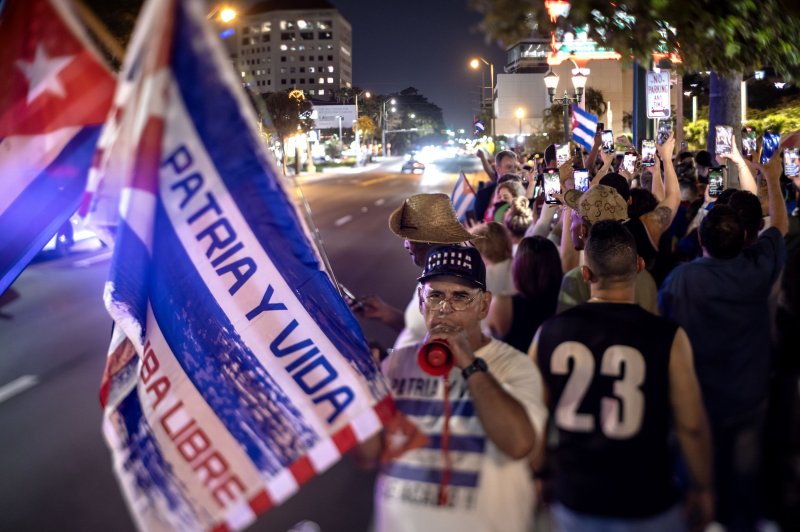 Hundreds of Cuban Americans gather in Miami on Sunday evening to support the weekend protests in Santiago, Cuba, and elsewhere on the island. Photo by Cristobal Herrera-Ulashkevich/EPA-EFE