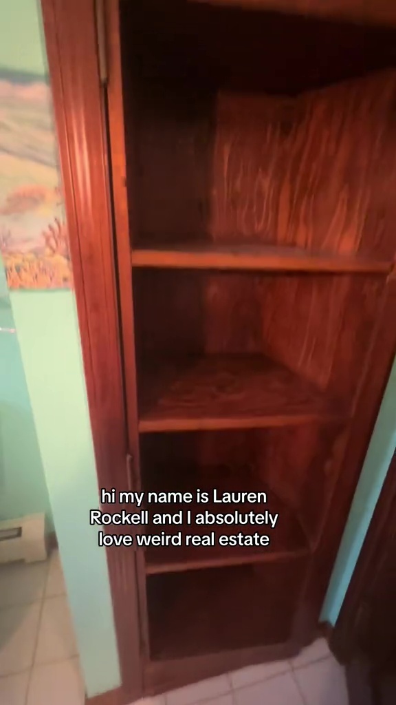 The room was hidden behind a wooden shelf