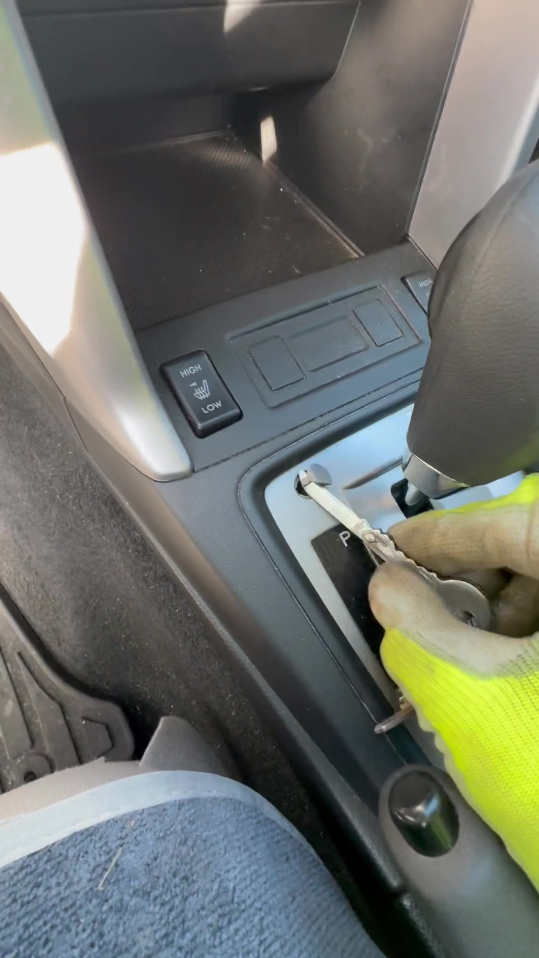 This tiny circular button will solve all your problems should you car break down on the road