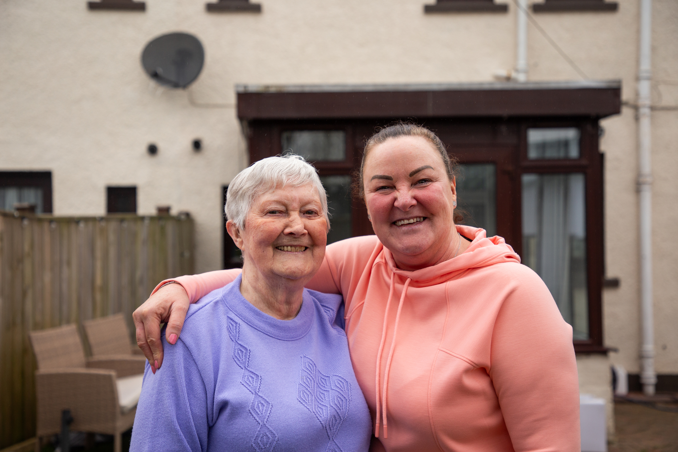 Sadie Docherty (left), 86, was overjoyed when she found out she'd won thousands this week from her home in Baillieston. Pictured right, with daughter Sharon