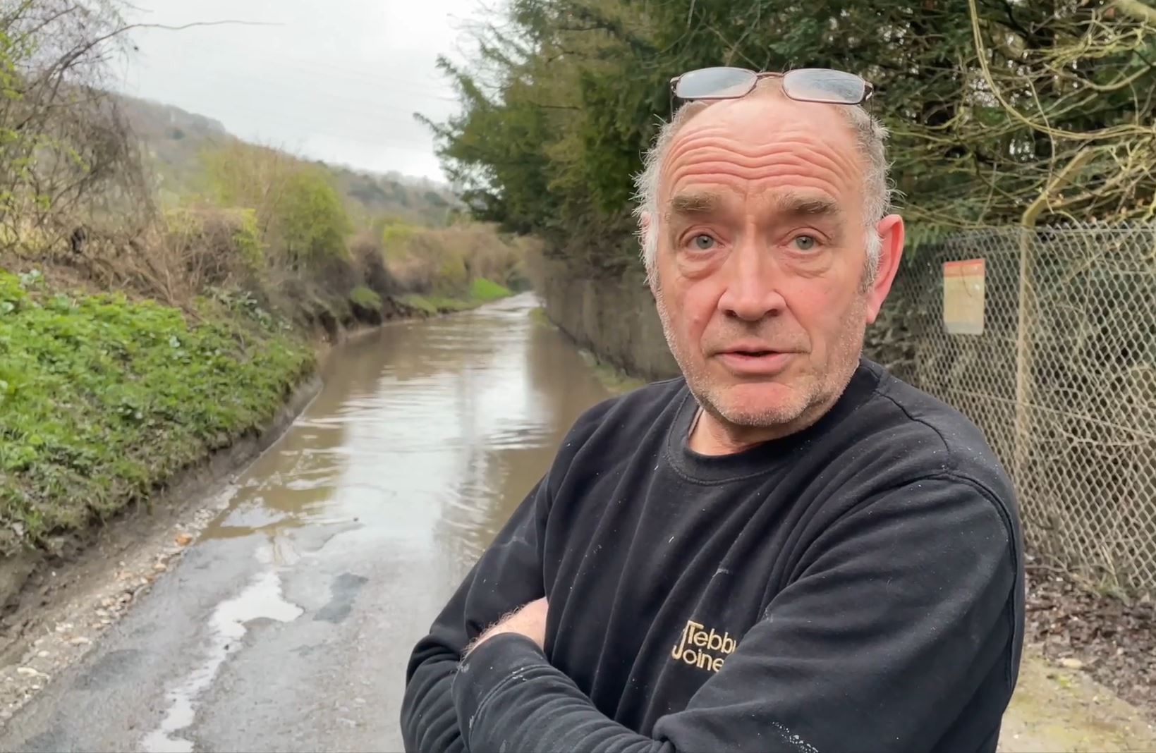 Adny Tebbutt says he's trapped in his home thanks to a 100-metre puddle which the council won't fix