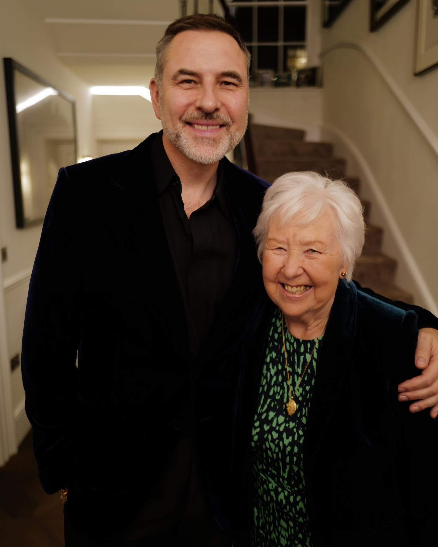 David with his beloved mum at his home