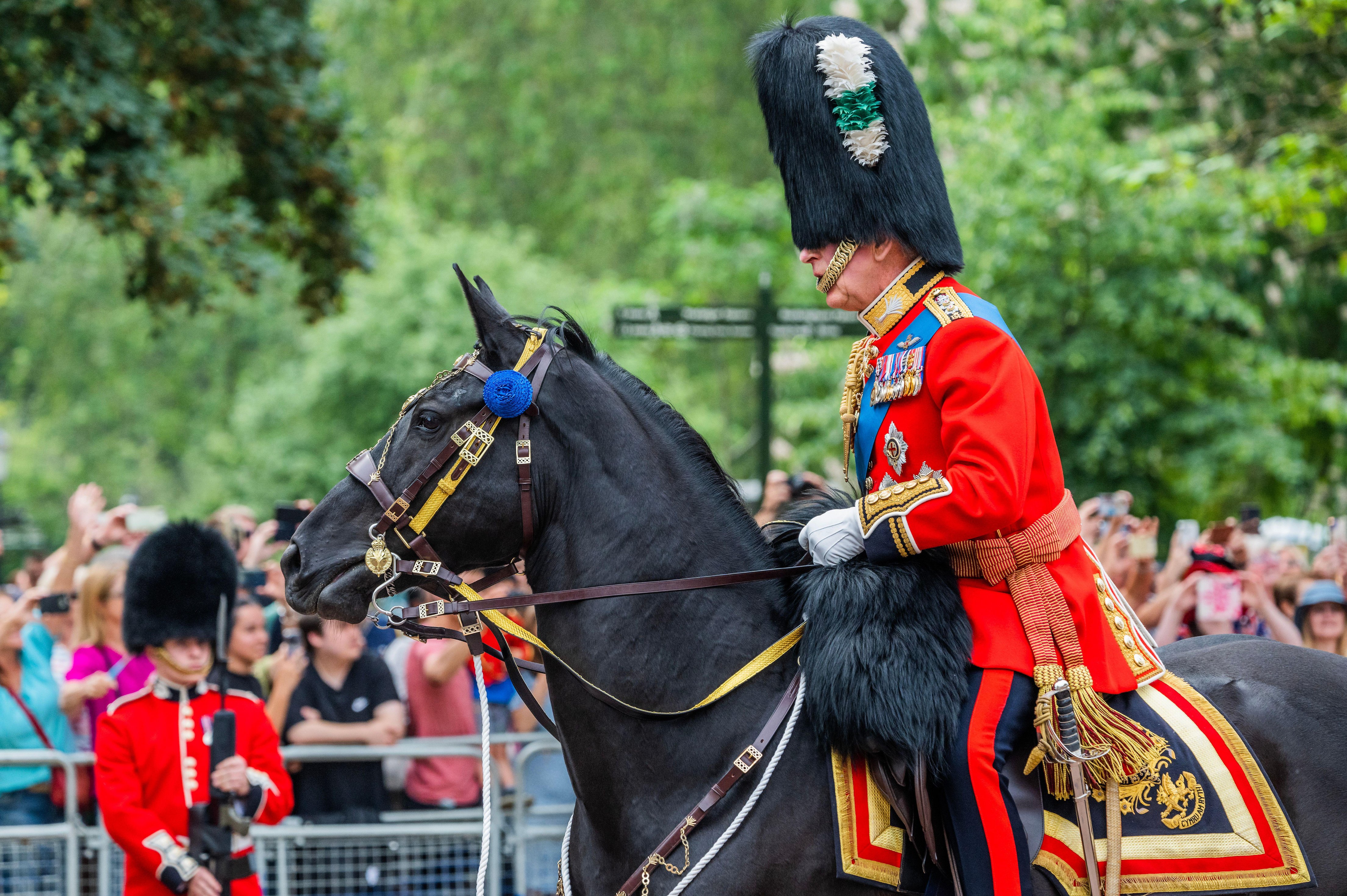 King Charles riding a horse at the celebration in 2023