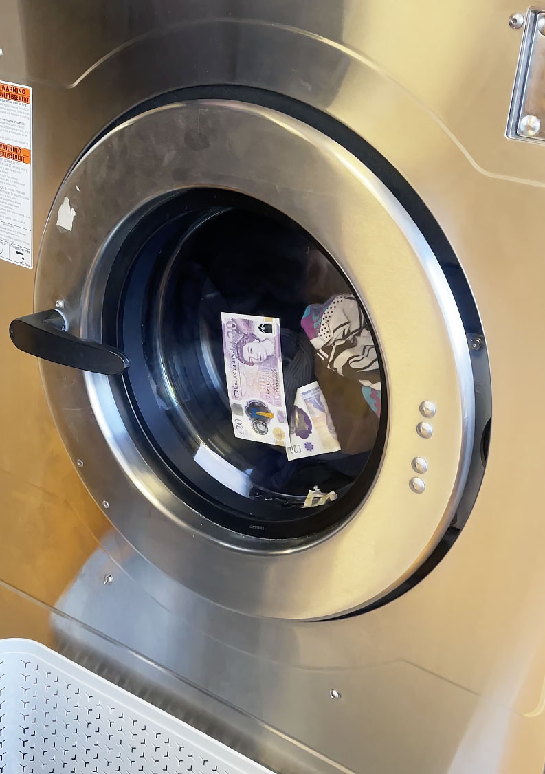 A laundrette owner found £500 had spilled out of a customer’s pockets inside one of his washing machines