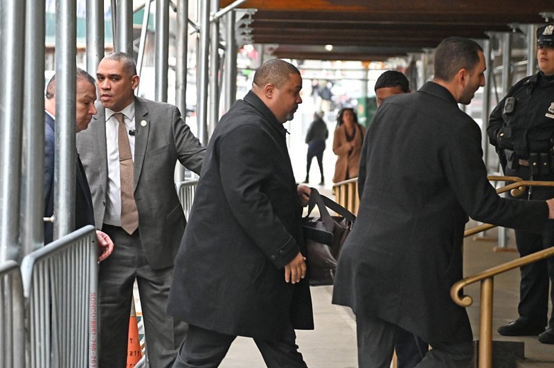 New York State Manhattan District Attorney Alvin Bragg enters the District Attorney's office in New York City on March 22. File Photo by Louis Lanzano/ UPI