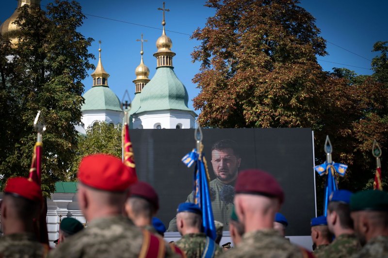 Members of the Ukrainian Armed Forces look on as Ukrainian President Volodymyr Zelensky speaks during an official celebration of Ukraine's 32nd Independence Day in Sophia Square in Kyiv, Ukraine on August 24, 2023. File Photo by Ukrainian President Press Office/ UPI