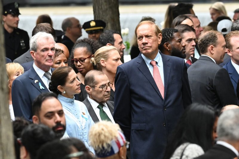 Former New York Gov. George Pataki, center, congressman Jerry Nadler, New Jersey Gov. Phil Murphy and wife, Tammy Murphy, attend a memorial at the site of the 2001 9/11 attacks on the World Trade Center, Sunday, Sept. 11, 2022, in New York City. Tammy Murphy has quit her campaign for the U.S. Senate. File Photo by Louis Lanzano/UPI