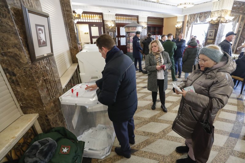 Russian people cast their ballots during the presidential elections in Moscow, Russia, on Friday. Four candidates registered by the Central Election Commission of the Russian Federation are vying for the post of head of state: Leonid Slutsky, Nikolai Kharitonov, Vladislav Davankov and Vladimir Putin. Photo by Maxim Shipenkov/EPA-EFE