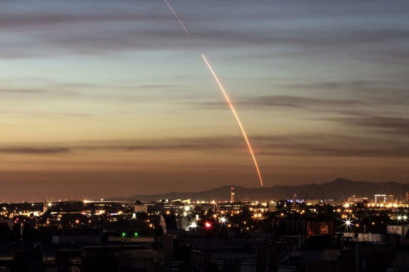 A SpaceX Falcon 9 rocket launch delivering 10 satellites to low-Earth orbit in 2017 caused a social media frenzy as observers throughout southern California thought the launch to be an alien invasion. A Department of Defense report Friday determined there was no evidence that the U.S. government has confirmed any UFO sightings were "extraterrestrial" in nature. File Photo courtesy SpaceX/UPI