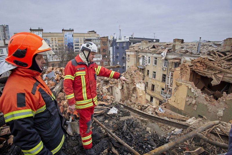 Ukrainian rescuers work on a residential building hit in Russian shelling in Kharkiv, Ukraine, on Jan. 30, 2023. UNESCO said Monday in a new report the Kharkiv Institute of Physics and Technologies sustained the highest number of destroyed or damaged buildings at 61. File photo by Sergey Kozlov/EPA-EFE