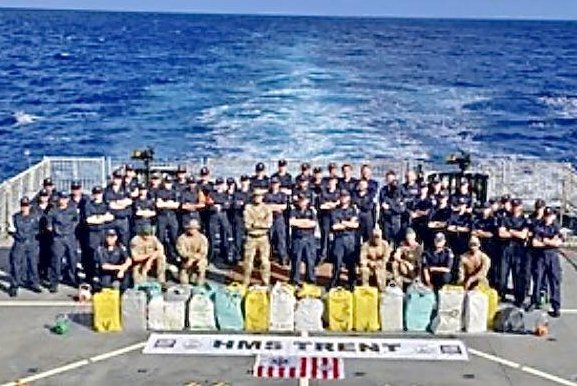 British sailors on the HMS Trent celebrate a coordinated drug bust with the U.S. Coast Guard near the U.S. Virgin Islands, netting approximately 6,000 pounds of cocaine, with an estimated street value of $280 million, officials announced Monday. Photo courtesy of U.K. Ministry of Defense