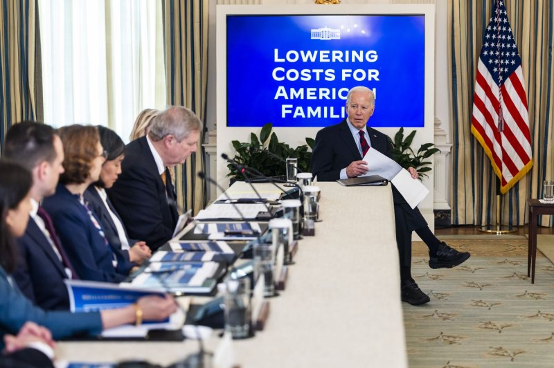 President Joe Biden meets Tuesday with his Competition Council, in the State Dining Room at the White House, to announce a new 'strike force,' led jointly by the Department of Justice and the Federal Trade Commission (FTC), to fight "corporate rip-offs," cut down on excessive credit card late fees and help make health care markets more affordable. Photo by Jim Lo Scalzo/UPI