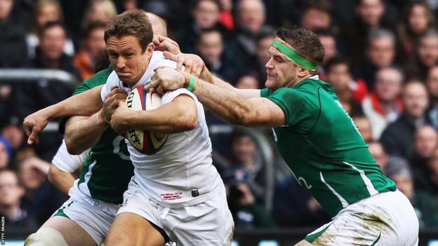 Jamie Heaslip tackles Jonny Wilkinson at Twickenham in 2010