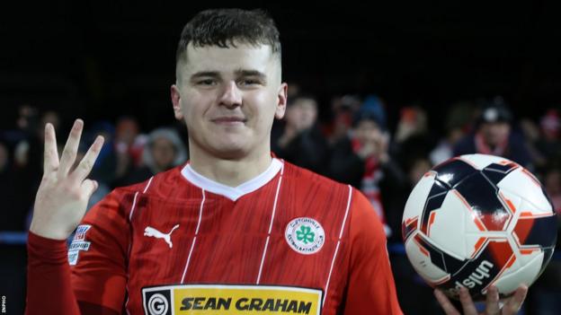 Ronan Hale celebrates scoring a treble in the fifth round against Coleraine