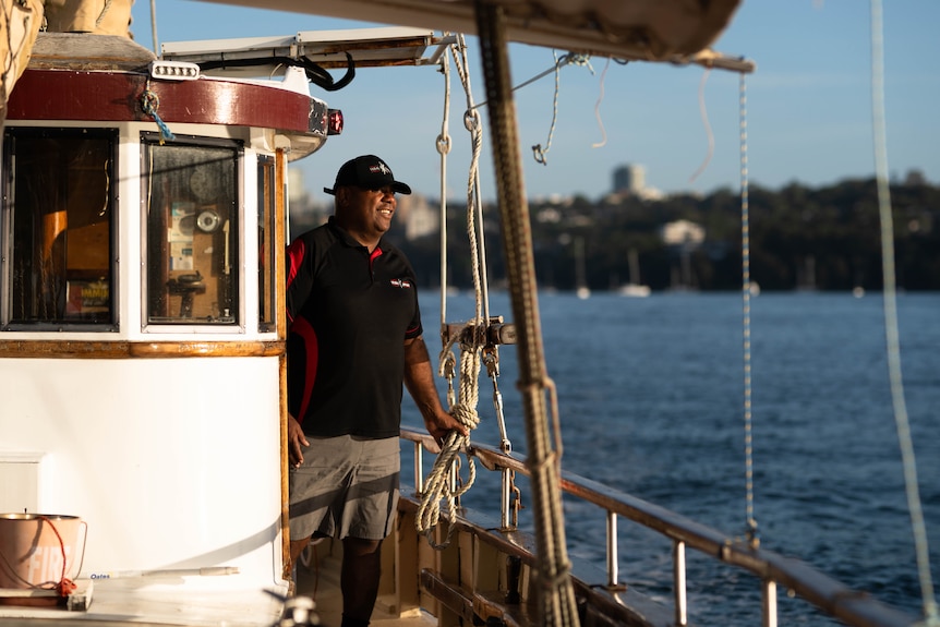 Portrait of a man aboard a boat, sunny weather