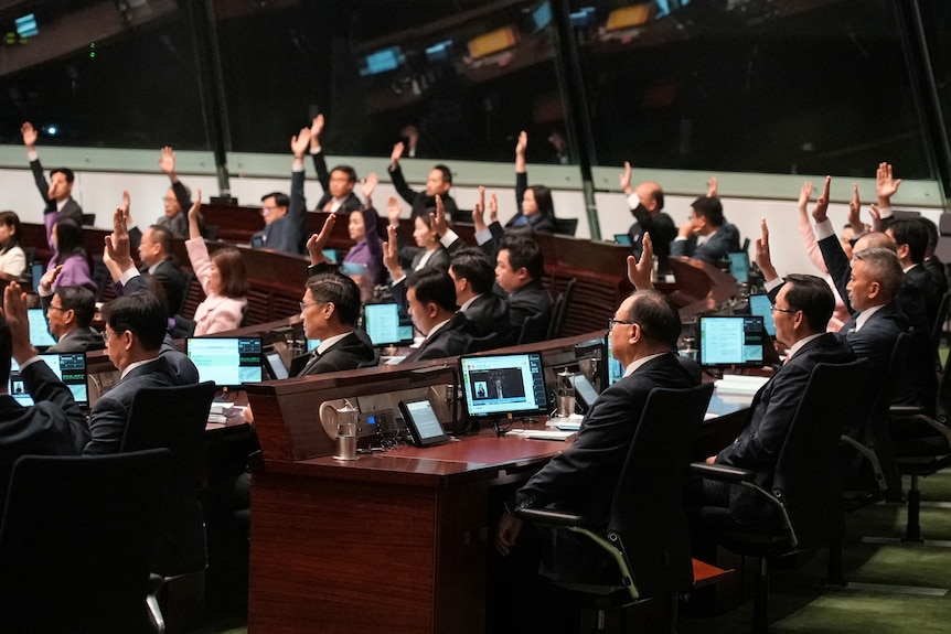 People raising their hands 