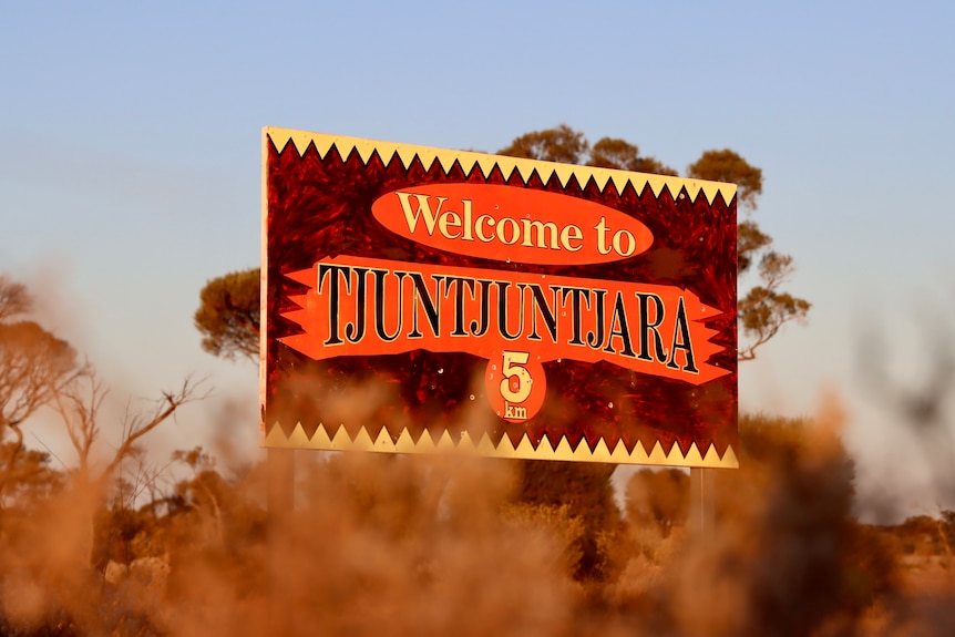 picture of sign with the name of the town 