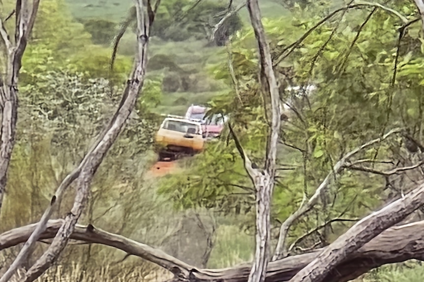 Two cars stuck in mud