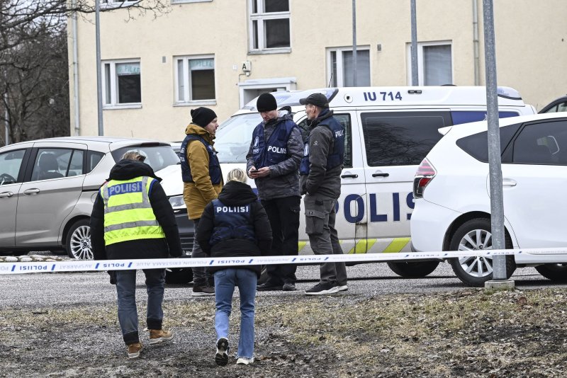 Police secure the scene of a school shooting in Vantaa, Finland, on Tuesday in which a sixth grader was killed and two classmates were injured after another 12-year-old opened fire with a handgun. Photo by Kimmo Brandt/EPA-EFE