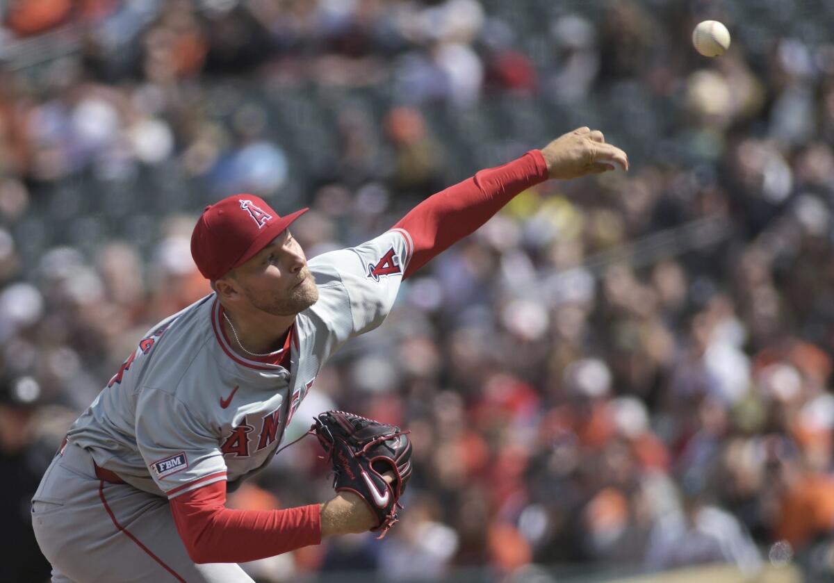 Angels starting pitcher Reid Detmers delivers a pitch from the mound