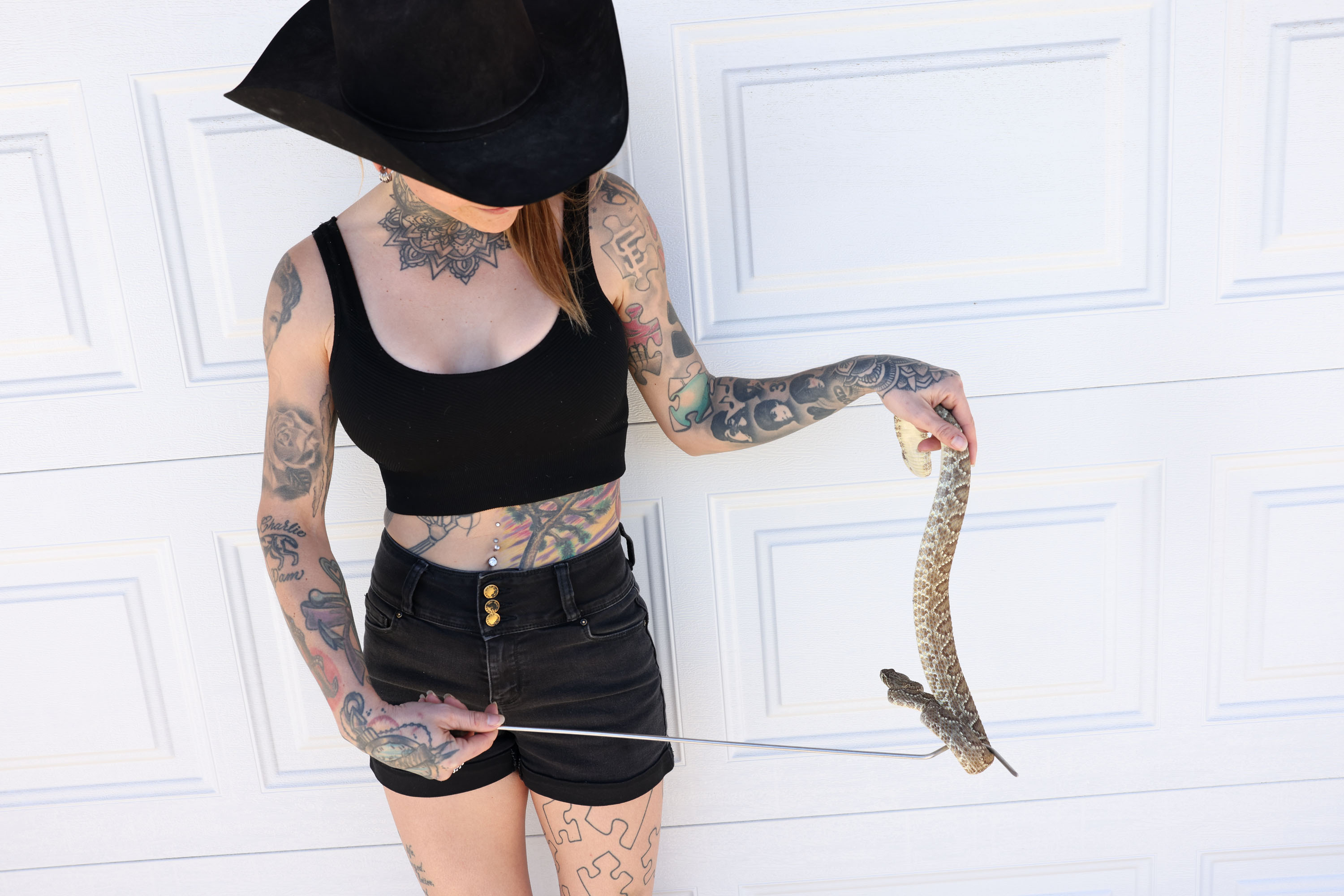 These days the heavily-tattooed beauty is known as the Snake Lady of Joshua Tree