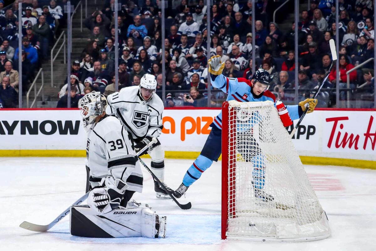 Winnipeg’s Cole Perfetti celebrates after the Jets score past Kings goaltender Cam Talbot.