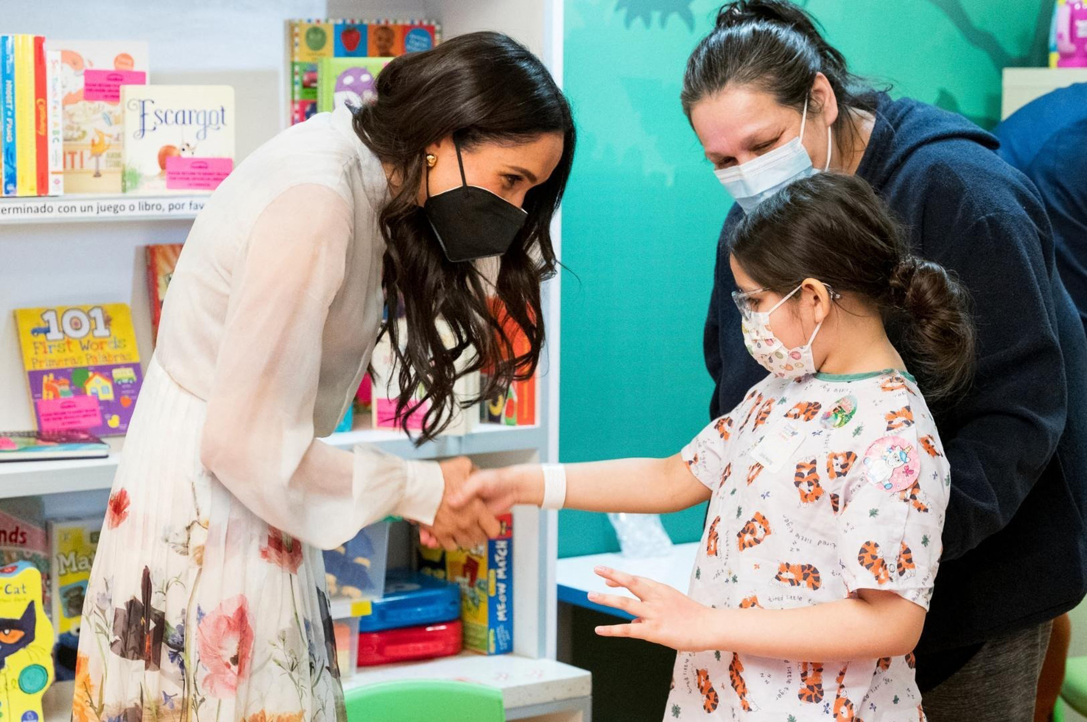 Meghan posed for pictures with the youngsters