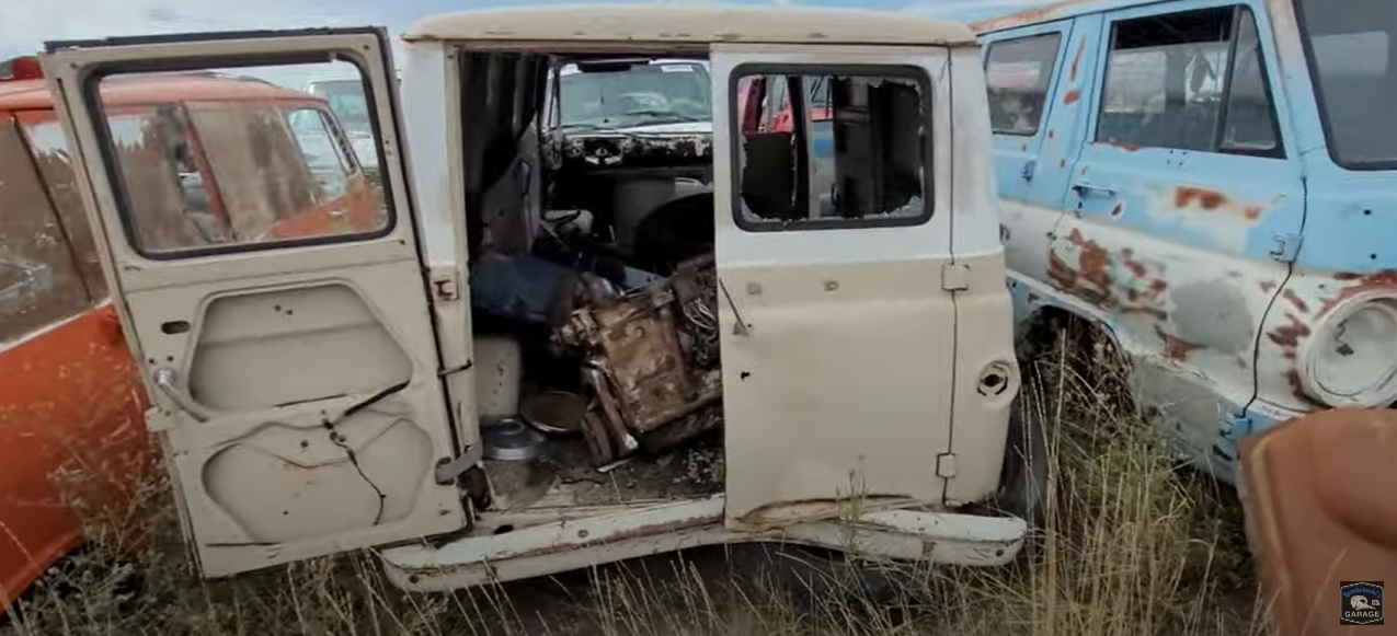 Here the door to the vehicle's boot has been left open and the windows are broken