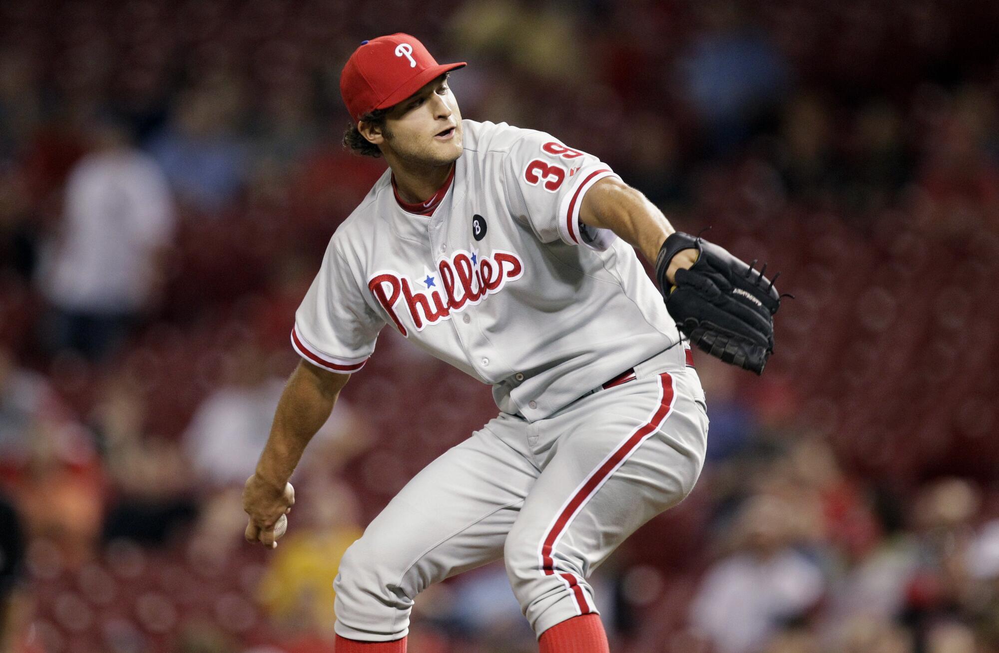 Phillies relief pitcher Michael Schwimer in action against the Reds in 2011