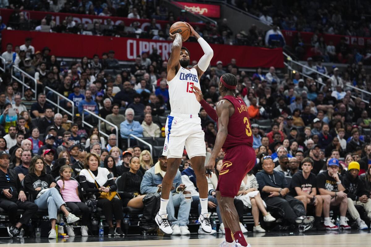 Paul George shoots during a win over the Cleveland Cavaliers on Sunday.