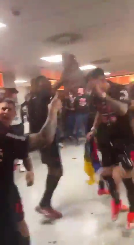 The players were dancing in the dressing room