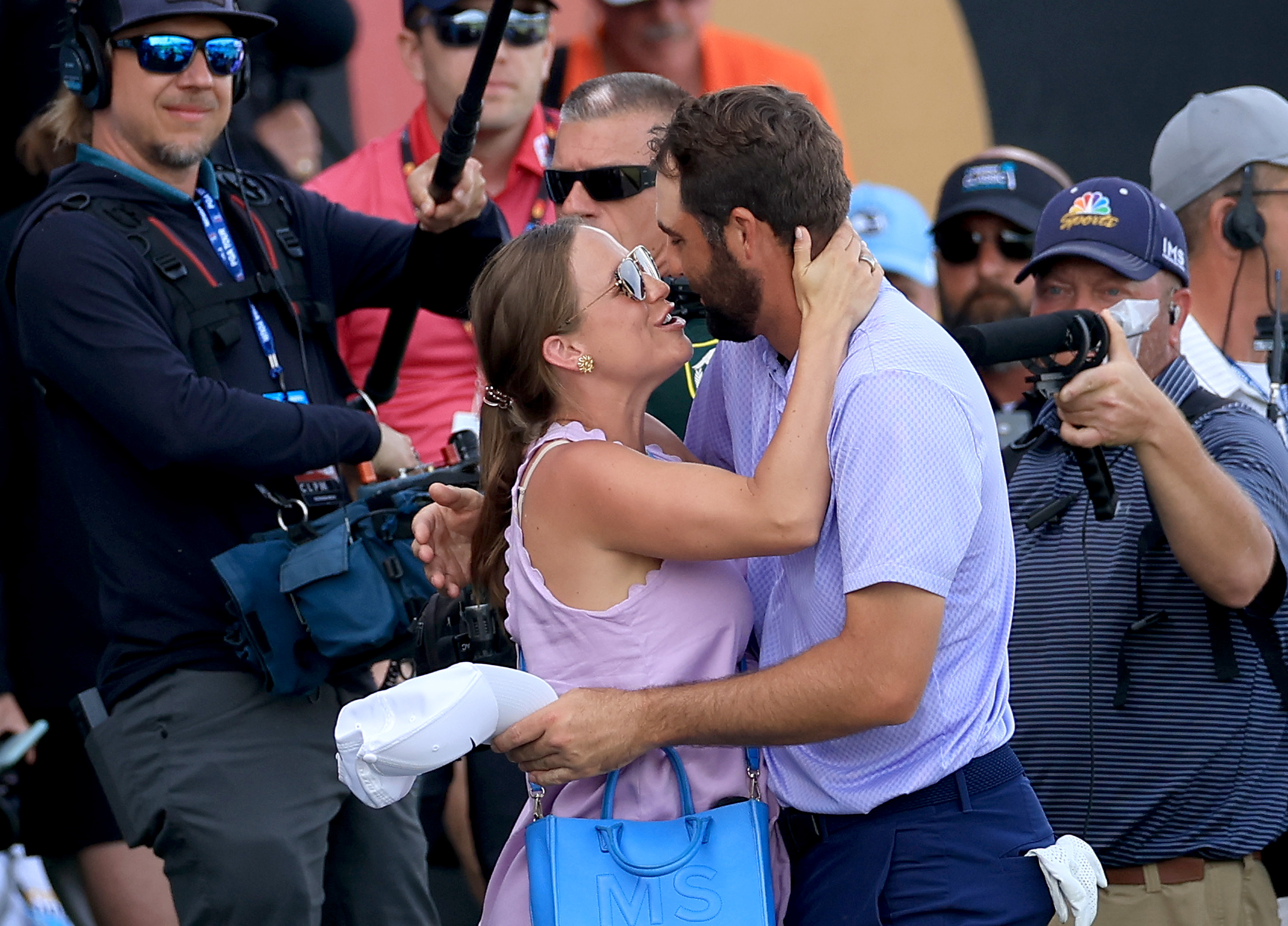 Scottie Scheffler and wife Meredith, pictured at a tournament earlier this year, are expecting their first child