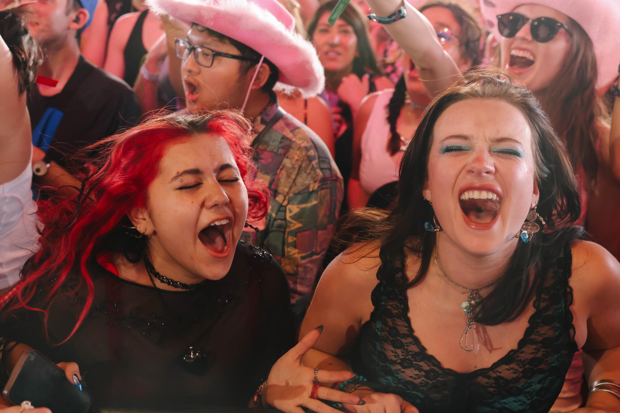 Fans listen to Chappell Roan perform at the Coachella Valley Music and Arts Festival.