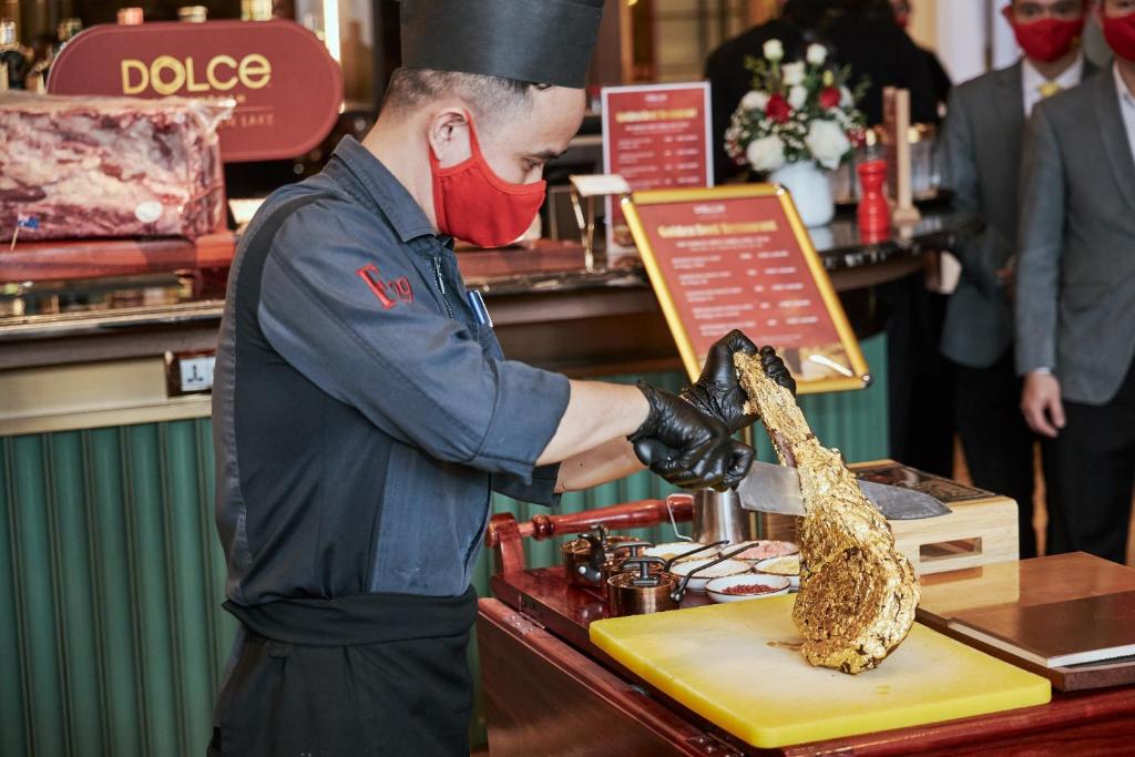 The hotel is famed for their golden menu including gold wrapped tomahawk steaks