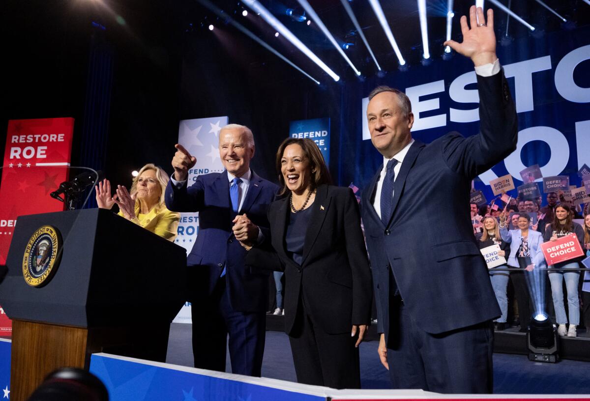 Vice President Kamala Harris walks on stage to speak before President Joe Biden 