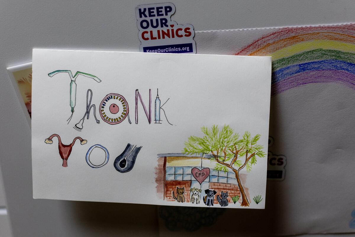 A Thank You card hangs on the refrigerator in the beak room at Camelback Family Planning on April 17, 2024