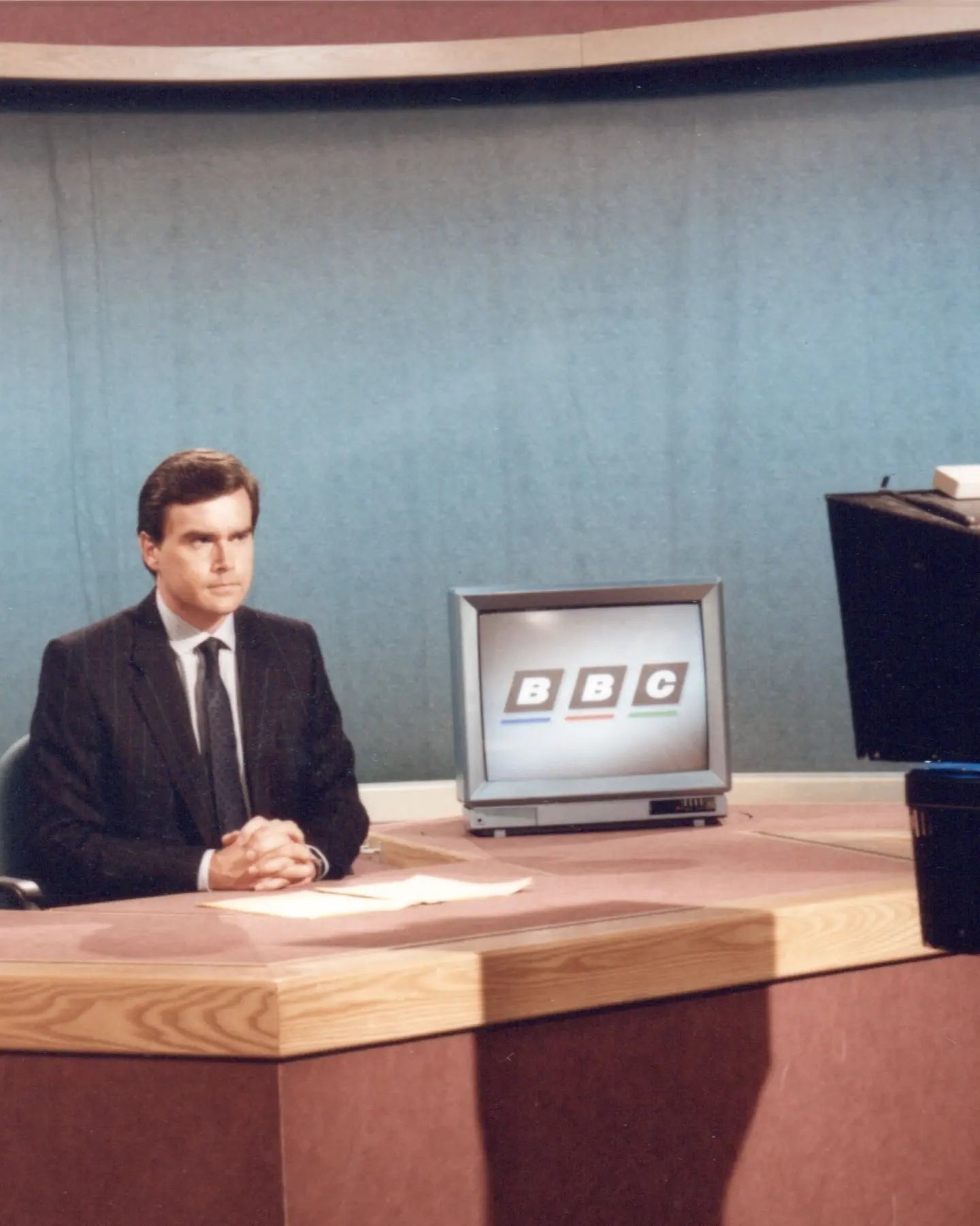 Edwards presenting BBC News earlier in his 40 year career