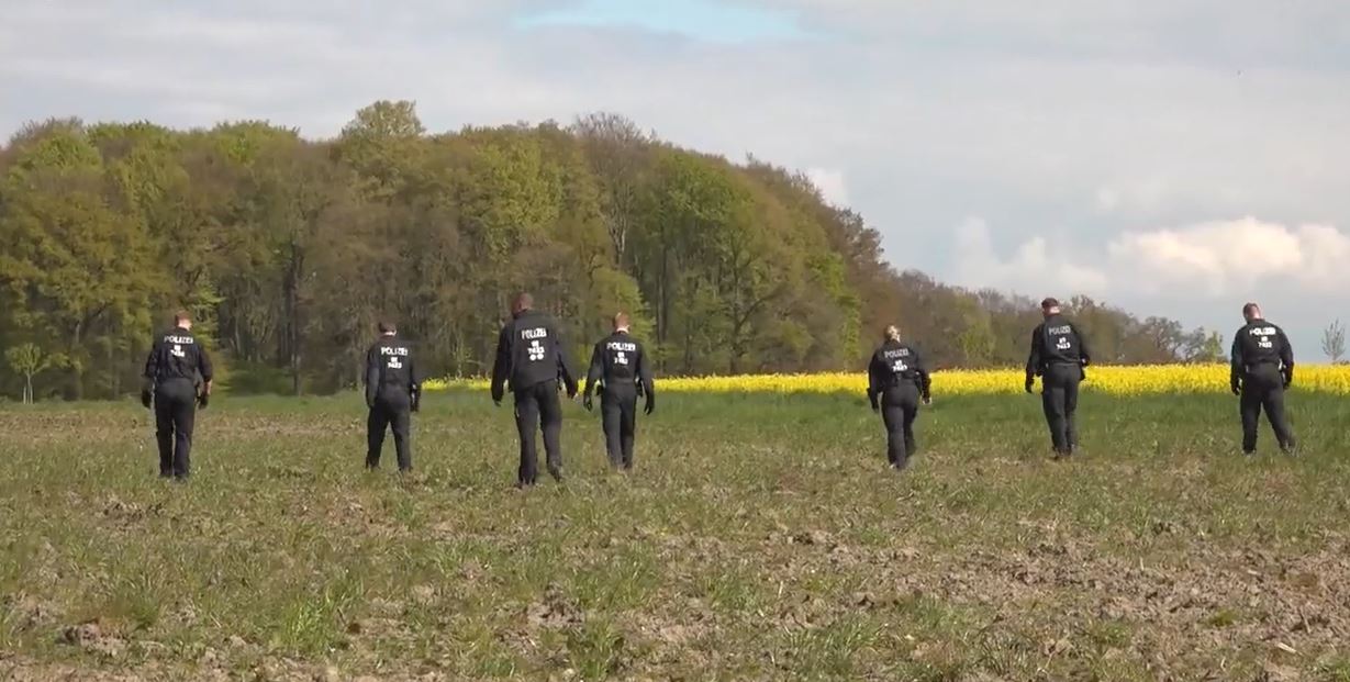 Police have fanned out across the fields near his home