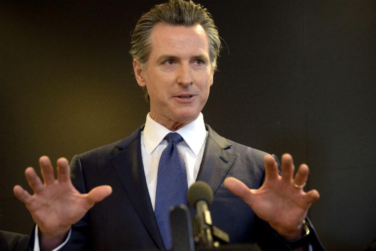 California Gov. Gavin Newsom speaks at a news conference in Sacramento.