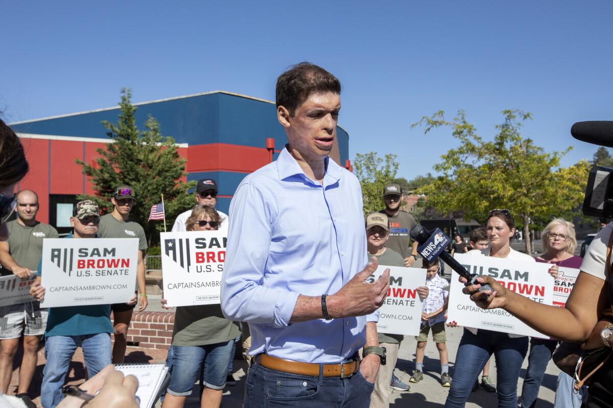 Nevada Republican U.S. Senate candidate Sam Brown speaks to reporters in 2022.