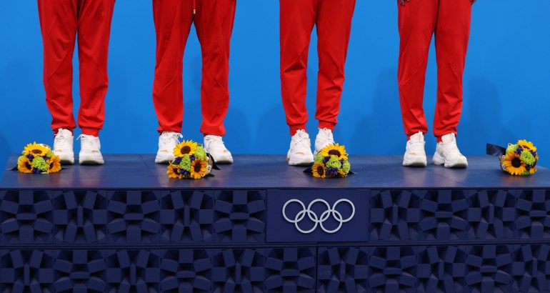 Tokyo 2020 Olympics - Swimming - Women's 4 x 200m Freestyle Relay - Medal Ceremony - Tokyo Aquatics Centre - Tokyo, Japan - July 29, 2021. Gold medallists Yang Junxuan of China, Tang Muhan of China, Zhang Yufei of China and Li Bingjie of China stand on the podium. REUTERS/Marko Djurica