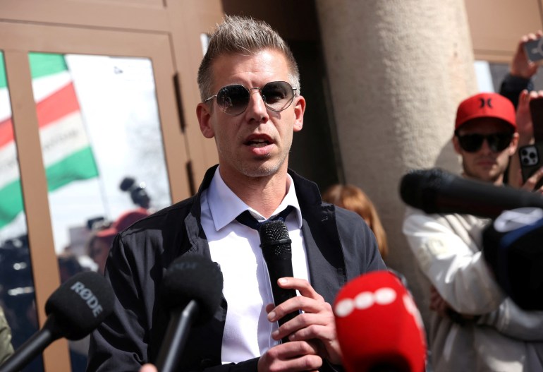 A lawyer and businessman formerly close to Hungary's ruling nationalist government, Peter Magyar talks to the media after his hearing at the Budapest Prosecutors Office in Budapest, Hungary, March 26, 2024. REUTERS/Bernadett Szabo